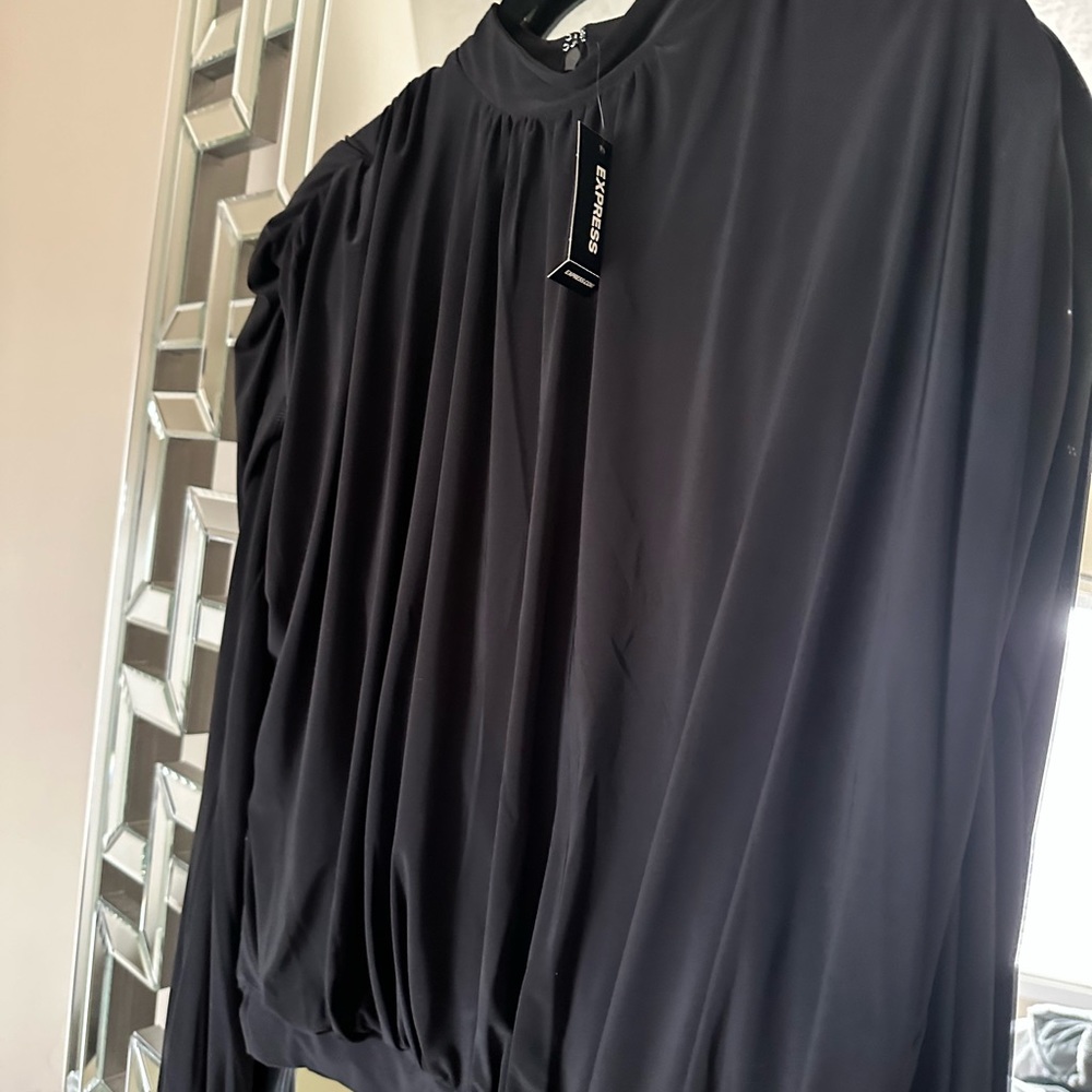 Cleaning out my closet.Need some space I bought this blouse couple of months ago